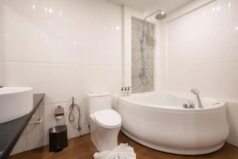Modern Bathroom with Corner Bathtub and Ergonomic Design Near Karon Beach