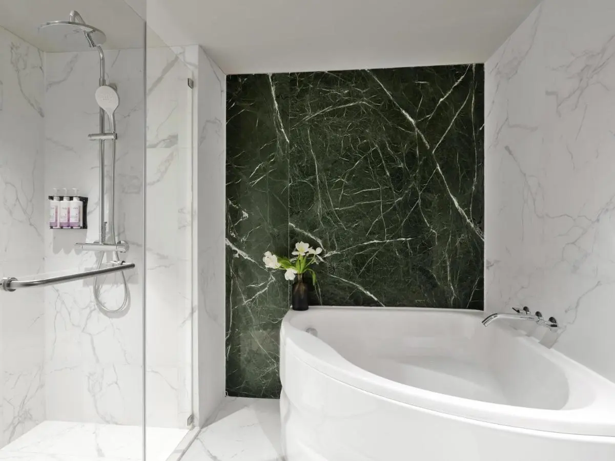 Modern Bathroom with Corner Bathtub and Glass Shower in Pathumwan, Bangkok