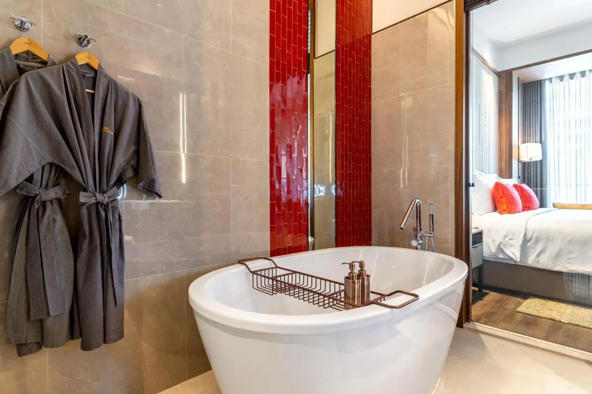 Modern Bathroom with Freestanding Bathtub and Bedroom View in Sathorn Bangkok