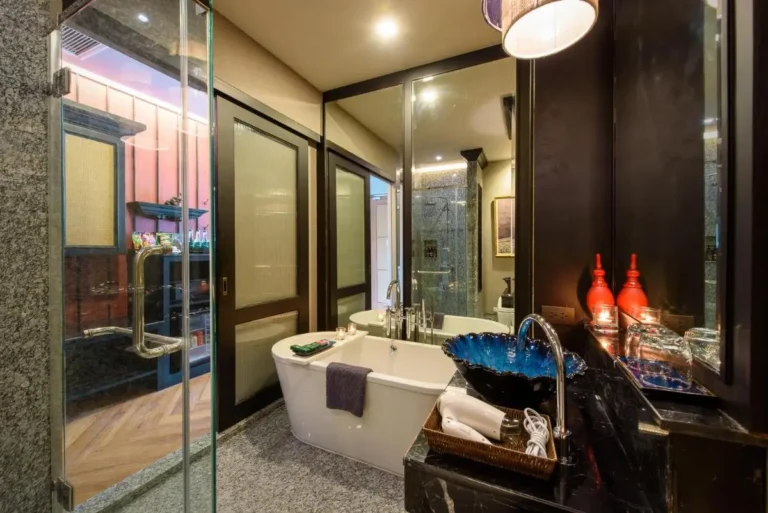 Modern Bathroom with Freestanding Bathtub and Blue Vessel Sink in Phra Sing Chiang Mai