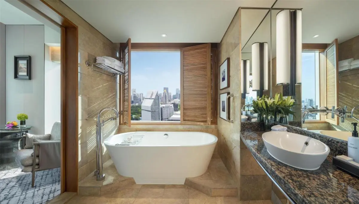 Modern Bathroom with Freestanding Bathtub and City View in Pathumwan Bangkok