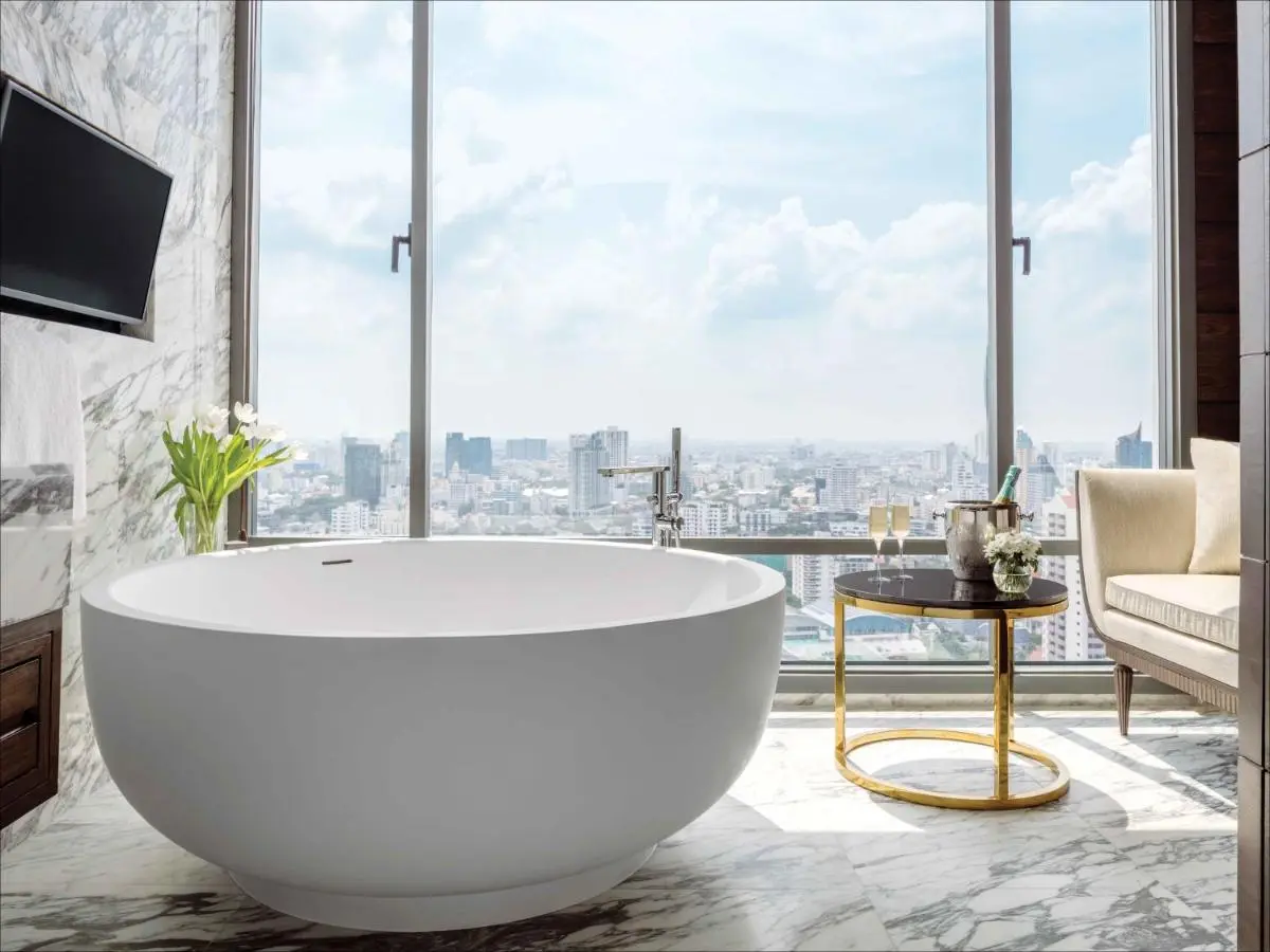 Modern Bathroom with Freestanding Bathtub and City View in Wattana Bangkok