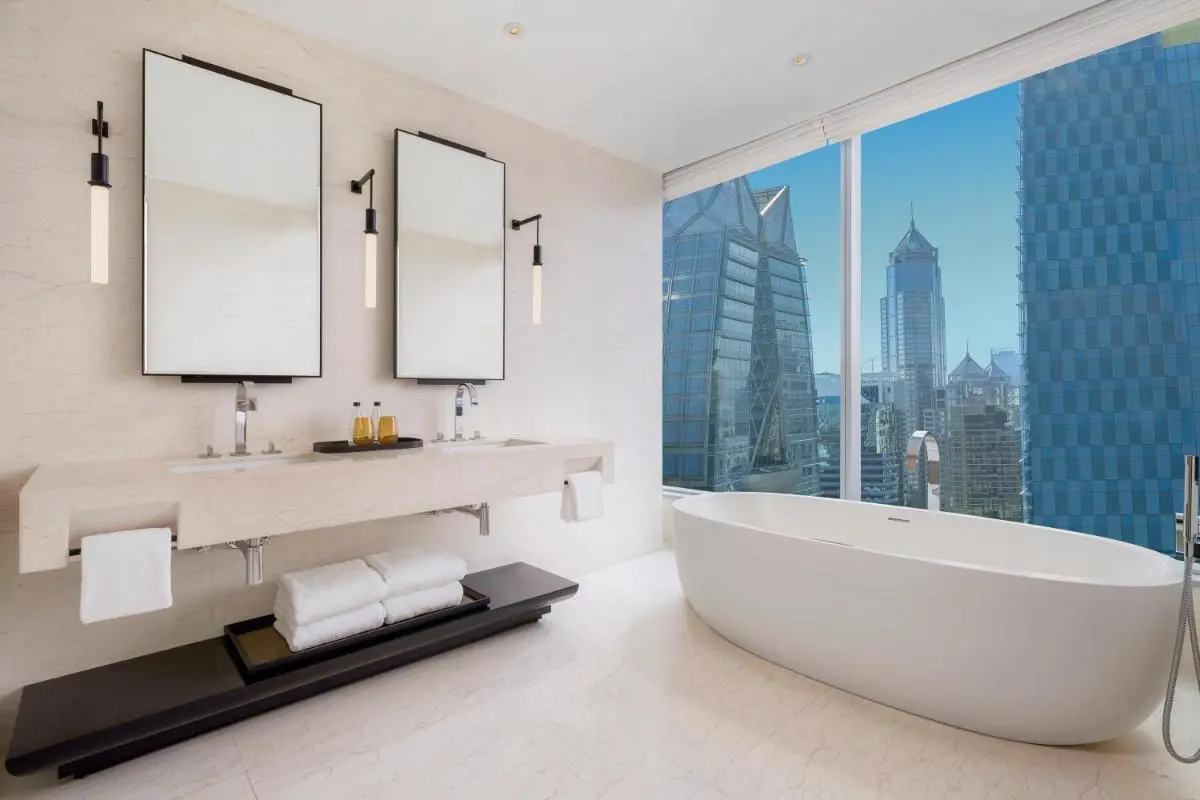 Modern Bathroom with Freestanding Bathtub and City Views in Pathumwan Bangkok