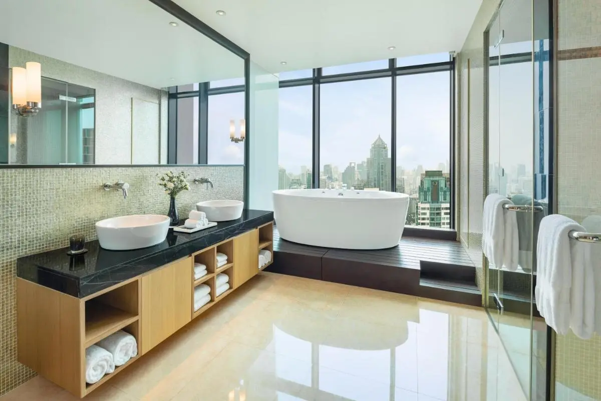 The St. Regis Bangkok Modern Bathroom with Freestanding Bathtub and City Views in Pathumwan Bangkok