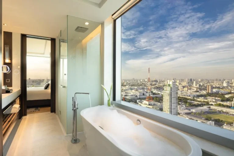 Modern Bathroom with Freestanding Bathtub and City Views in Ratchathewi Bangkok