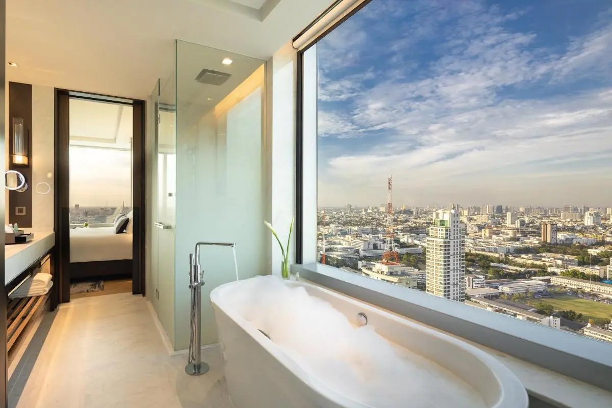 Modern Bathroom with Freestanding Bathtub and City Views in Ratchathewi Bangkok