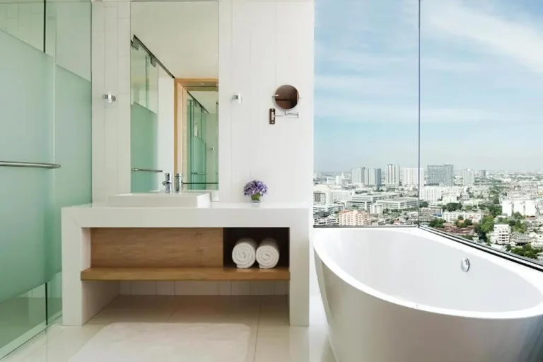 Modern Bathroom with Freestanding Bathtub and City Views in Thonburi Bangkok