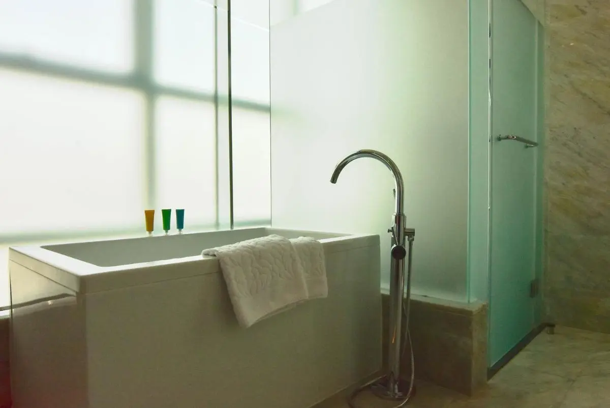 Modern Bathroom with Freestanding Bathtub and Frosted Glass in Huai Khwang