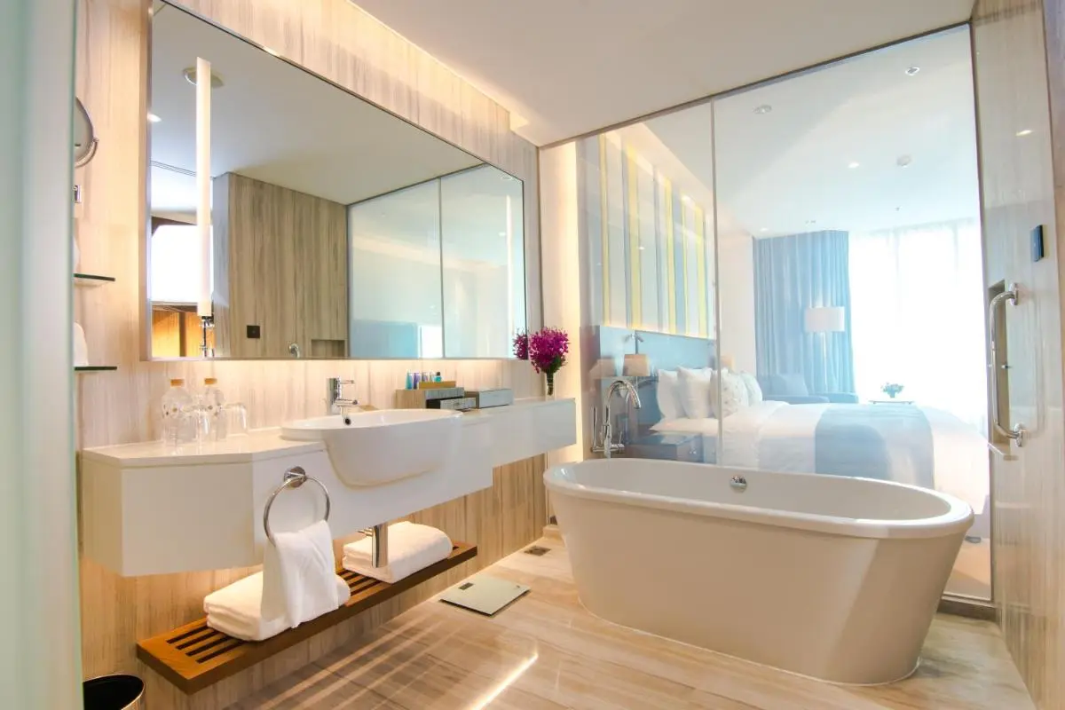 Modern Bathroom with Freestanding Bathtub and Glass Partition in Huai Khwang