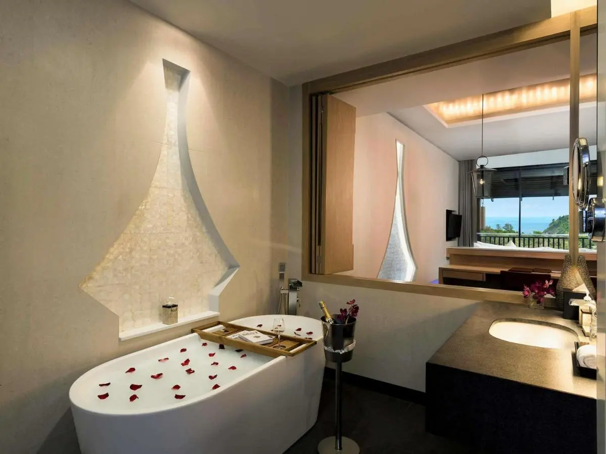 Modern Bathroom with Freestanding Bathtub and Scenic Ocean View at Patong Beach