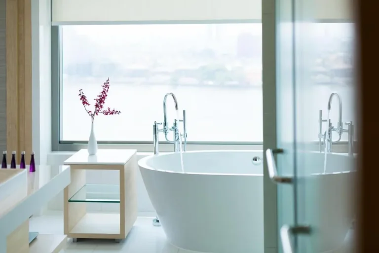 Modern Bathroom with Freestanding Bathtub and Scenic Views in Thonburi