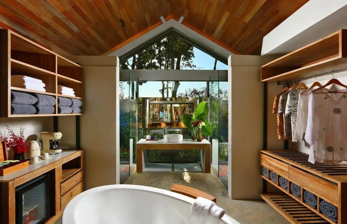 Modern Bathroom with Freestanding Bathtub and Scenic Water View in Phuket Town