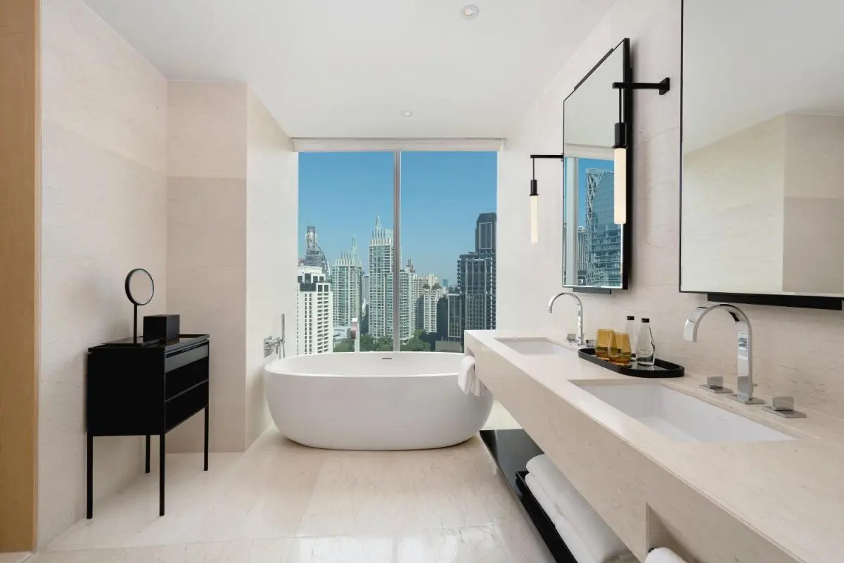 Park Hyatt Bangkok Modern Bathroom with Freestanding Tub and City View in Pathumwan Bangkok