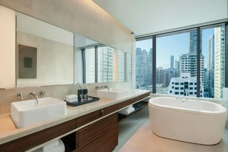 Modern Bathroom with Freestanding Tub and City Views in Pathumwan Bangkok