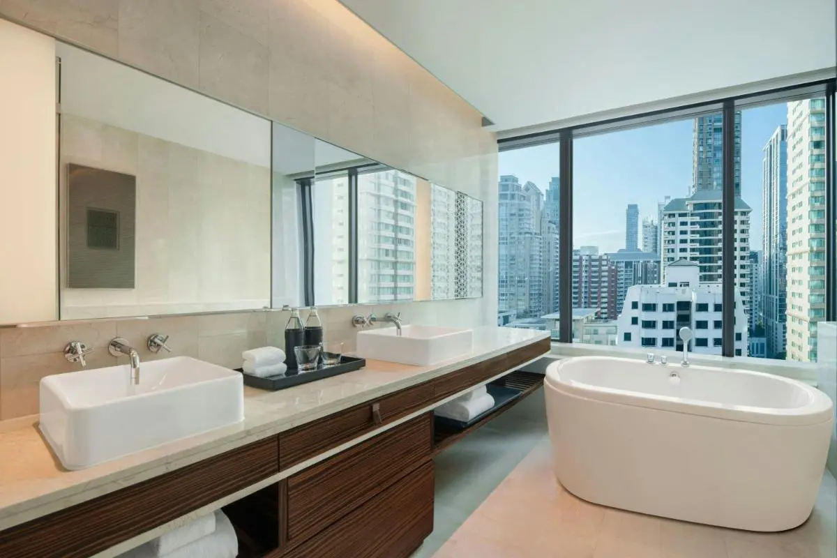 Renaissance Bangkok Ratchaprasong Hotel by Marriott Modern Bathroom with Freestanding Tub and City Views in Pathumwan Bangkok