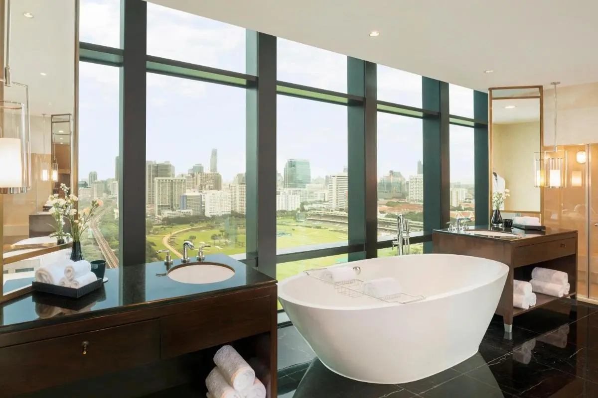 Modern Bathroom with Freestanding Tub and City Views in Pathumwan Bangkok