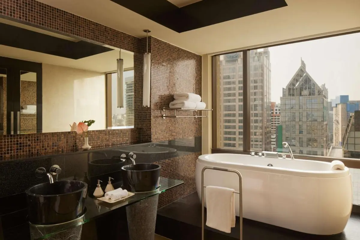 Modern Bathroom with Freestanding Tub and Double Sinks in Sathorn City View