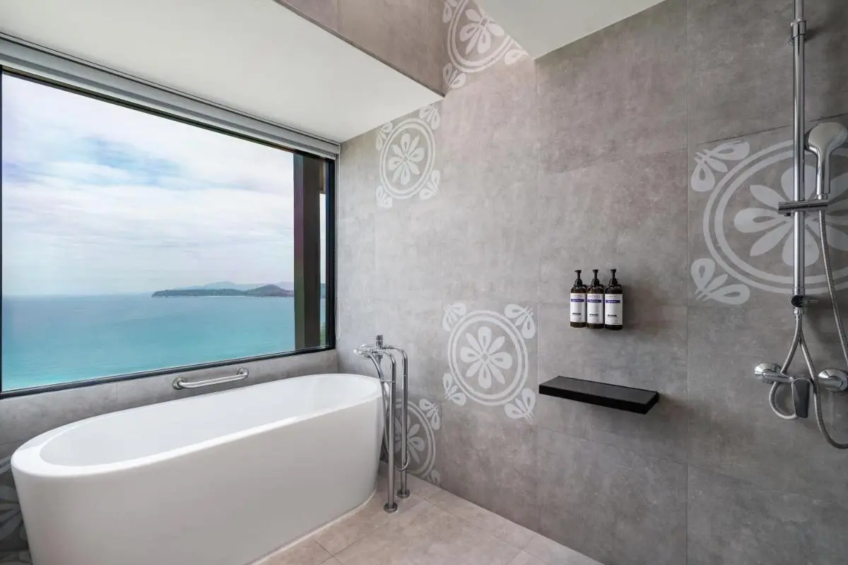 Modern Bathroom with Freestanding Tub and Ocean View at Kamala Beach