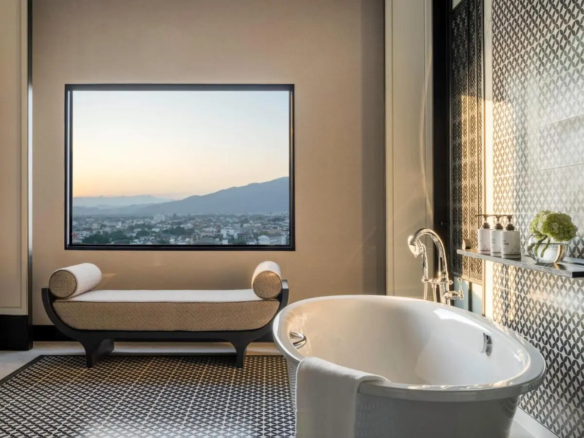 Modern Bathroom with Freestanding Tub and Scenic Urban Views in Chang Khlan Chiang Mai
