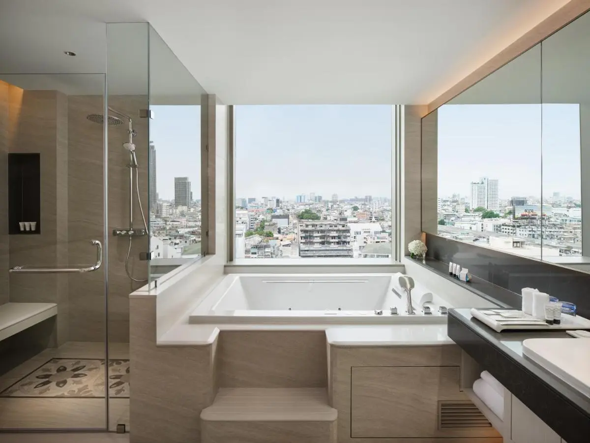 Modern Bathroom with Jacuzzi Bathtub and City View in Bang Rak Bangkok