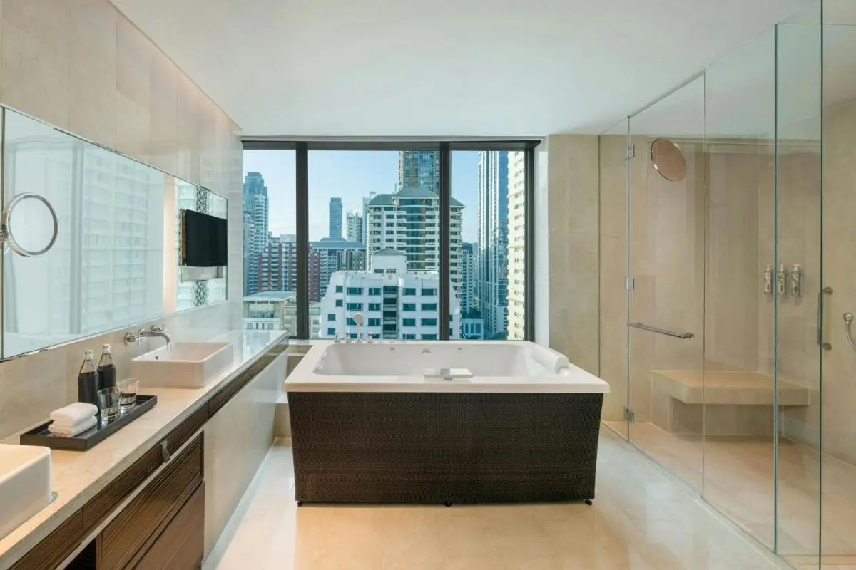 Modern Bathroom with Jacuzzi Tub and City View in Pathumwan Bangkok