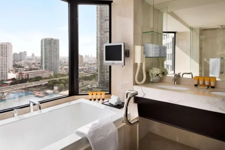 Modern Bathroom with Large Bathtub and Cityscape View in Bang Rak Bangkok