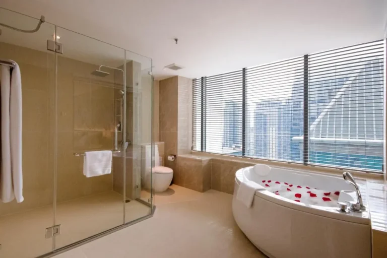 Modern Bathroom with Oval Bathtub and City View in Pathumwan Bangkok