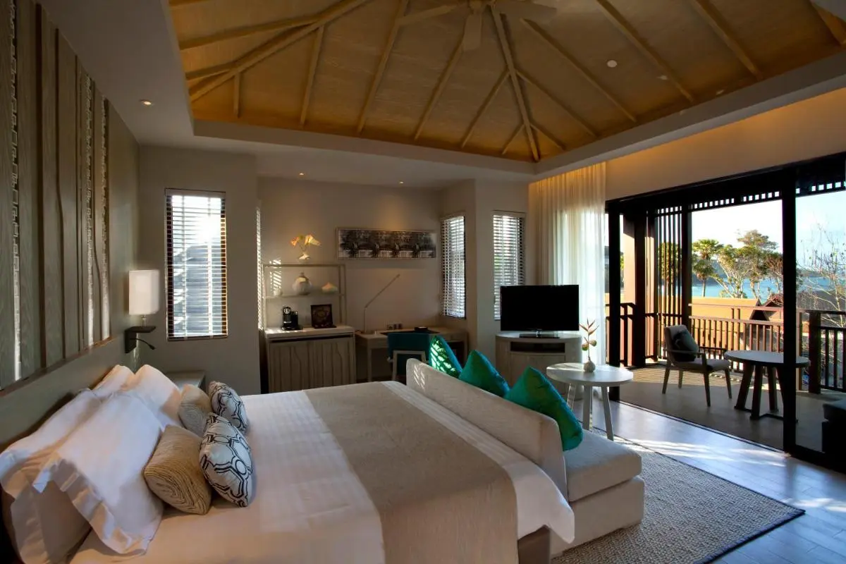 Modern Bedroom with Balcony Overlooking Water at Nai Thon Beach Retreat