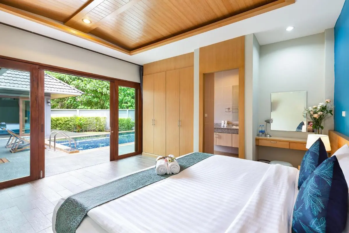 Modern Bedroom with Direct Access to Outdoor Pool and Relaxing Patio Area in Rawai Beach