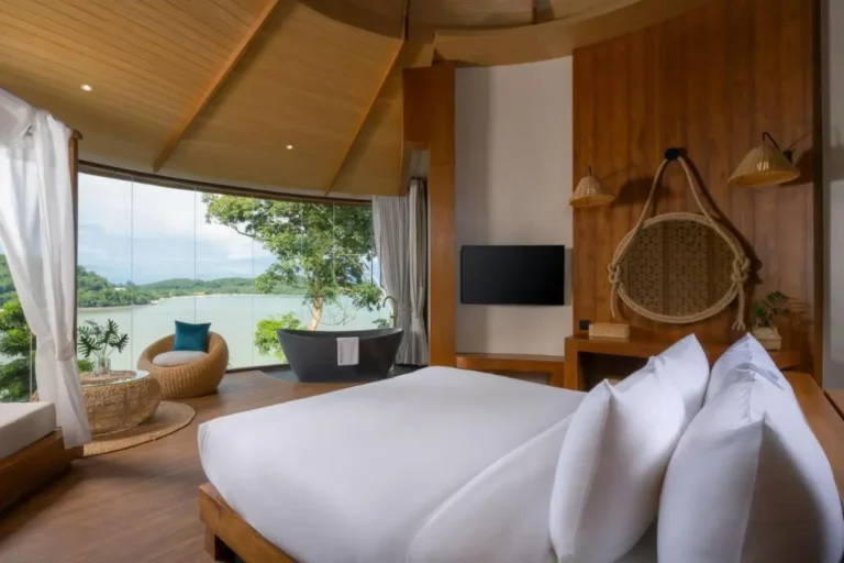 Modern Bedroom with Freestanding Bathtub and Scenic Lake View in Phuket Town