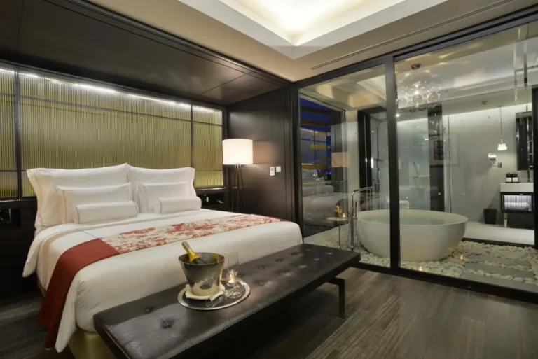 Modern Bedroom with Integrated Wellness Area Featuring Round Bathtub in Chiang Mai