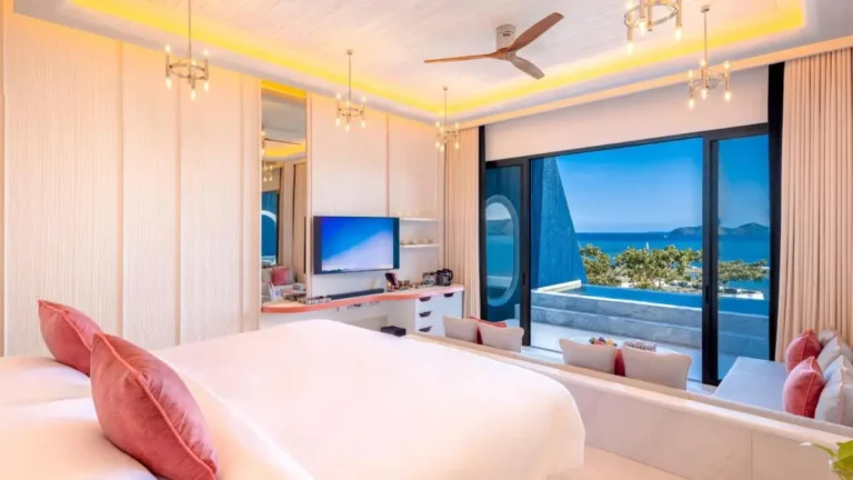 Modern Bedroom with Ocean View Balcony and Contemporary Interior Design at Panwa Beach
