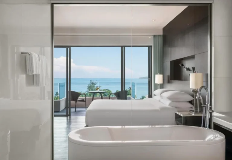 Modern Coastal Room with Freestanding Bathtub and Ocean View Balcony at Kamala Beach Modern Coastal Room with Freestanding Bathtub and Ocean View Balcony at Kamala Beach