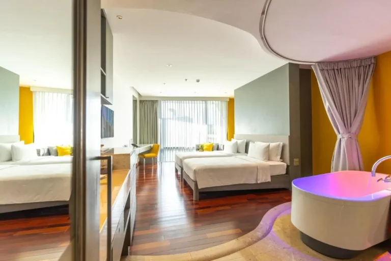 Modern Hotel Room with Freestanding Bathtub and Relaxing Lighting in Pathumwan Bangkok
