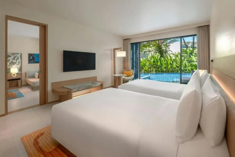 Modern Hotel Room with Outdoor Swimming Pool and Garden View at Mai Khao Beach