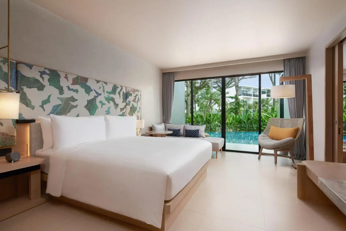Modern Hotel Room with Private Pool and Outdoor Seating at Mai Khao Beach