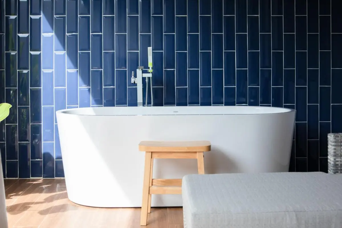 Lalynn Resort & Villas, Phuket Modern Indoor Bathroom with Freestanding Bathtub and Blue Tiled Wall in Thalang