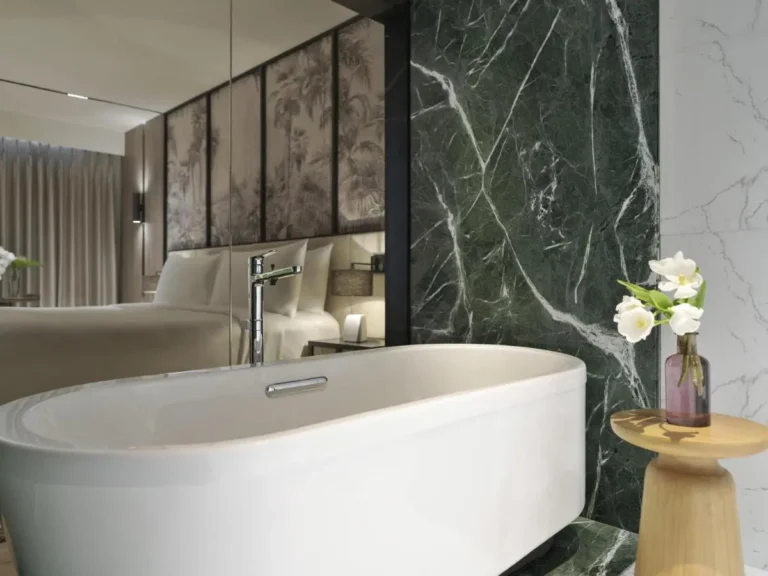 Modern Indoor Bathroom with Freestanding Bathtub and Marble Wall in Pathumwan