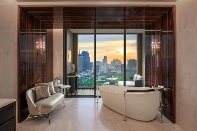 Modern Indoor Bathtub and Lounge Area with City View in Pathumwan Bangkok