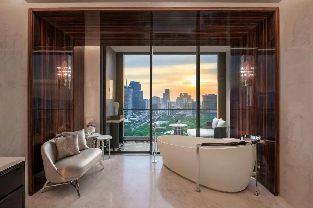 Modern Indoor Bathtub and Lounge Area with City View in Pathumwan Bangkok