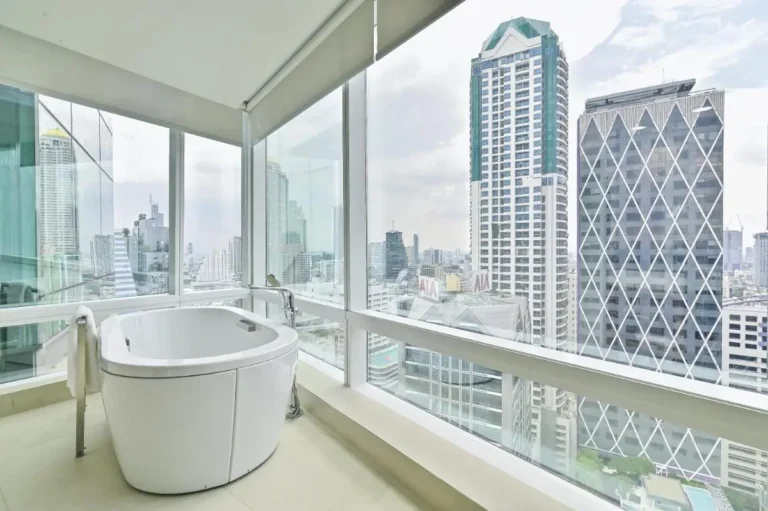 Modern Indoor Freestanding Bathtub with Panoramic City Views in Sathorn Bangkok