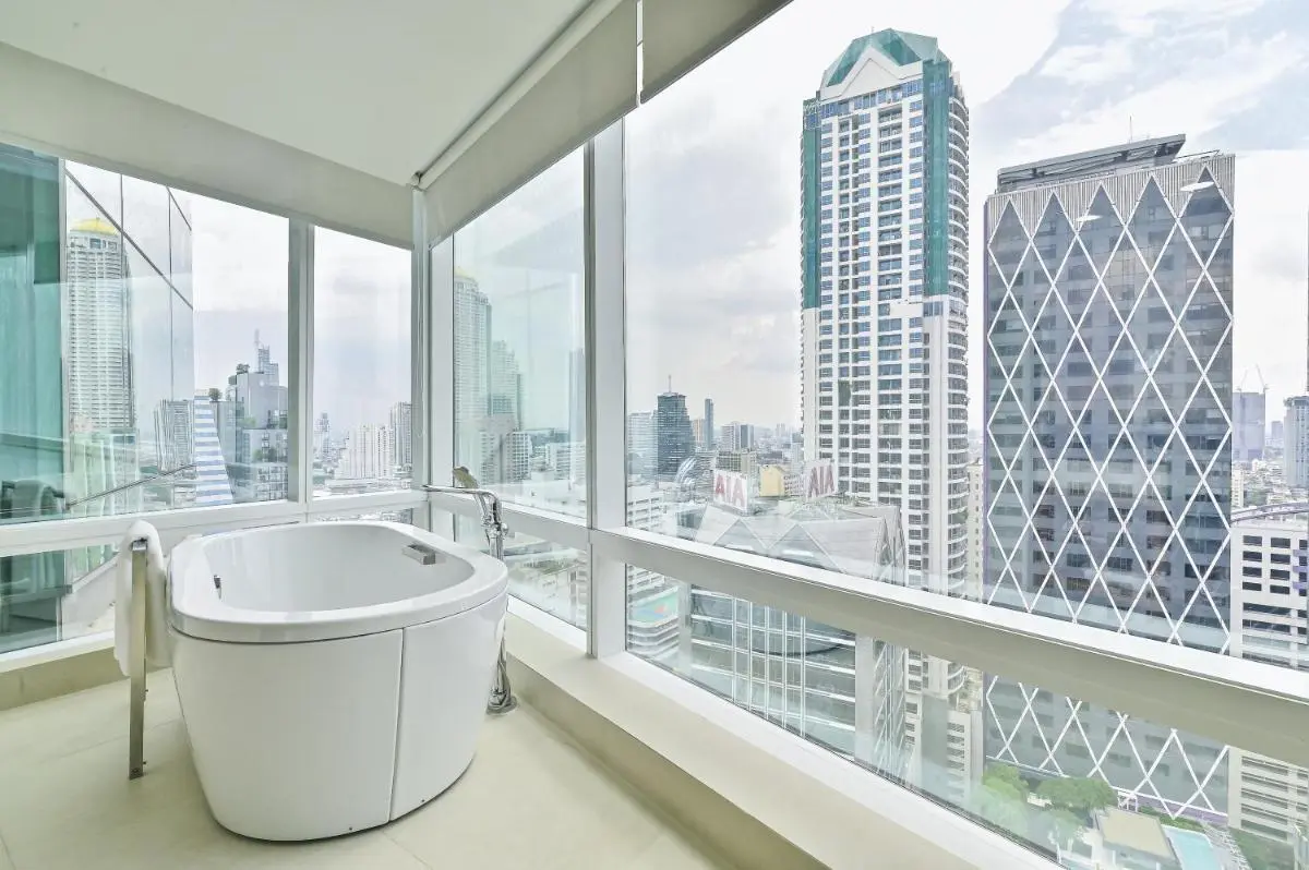 Modern Indoor Freestanding Bathtub with Panoramic City Views in Sathorn Bangkok