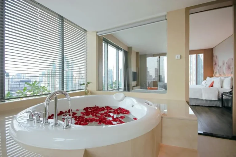 Modern Indoor Jacuzzi and Relaxation Area with City Views in Pathumwan Bangkok