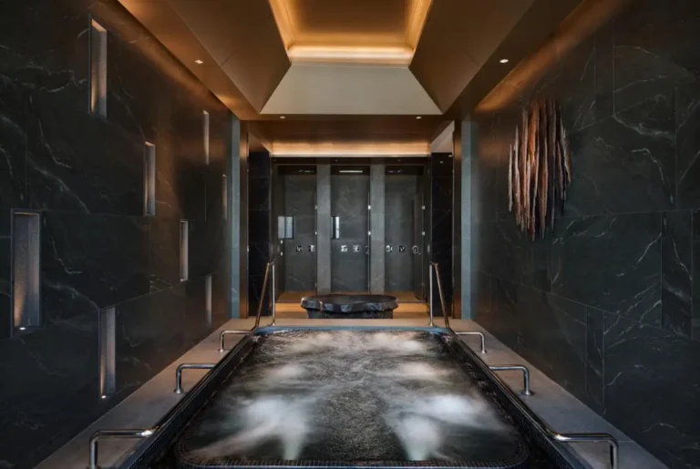 Modern Indoor Jacuzzi and Shower Wellness Area with Stone and Wood in Sathorn Bangkok