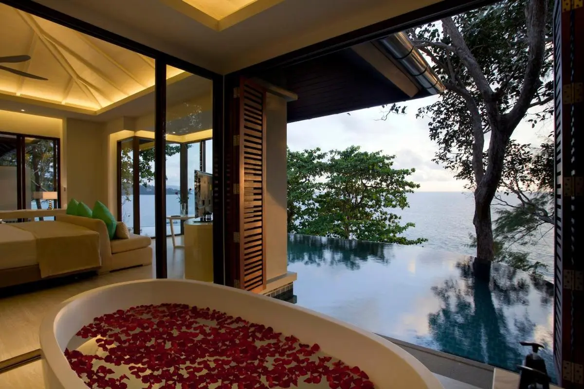 Phuket Province Modern Indoor-Outdoor Living Space Featuring Infinity Pool and Wellness Bathtub at Nai Thon Beach