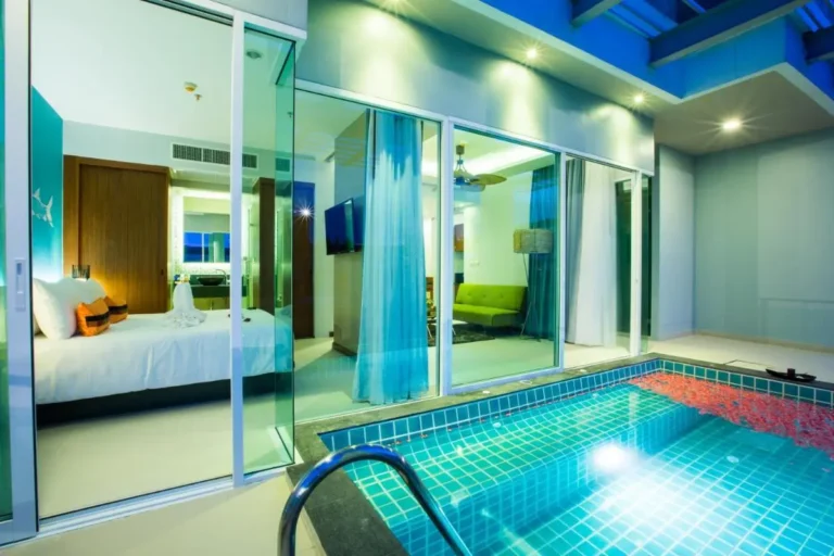 Modern Indoor Pool and Relaxation Room with Jacuzzi Features at Patong Beach