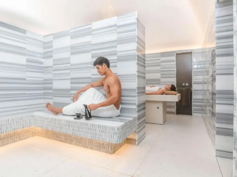 Modern Indoor Spa and Hydrotherapy Room with Tiled Benches in Ratchathewi Bangkok