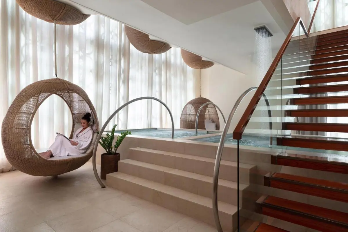 The St. Regis Bangkok Modern Indoor Wellness Area with Hydrotherapy Pools and Hanging Chairs in Pathumwan Bangkok