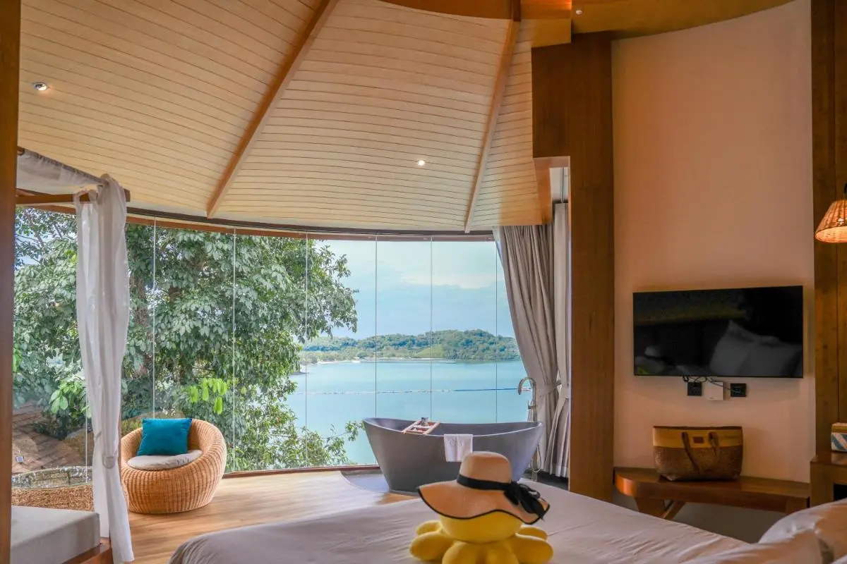 Modern Interior with Freestanding Bathtub and Panoramic Waterfront View in Phuket Town