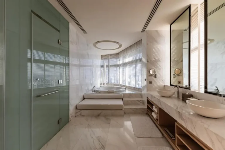 Modern Marble Bathroom with Round Bathtub and City Views in Wattana Bangkok